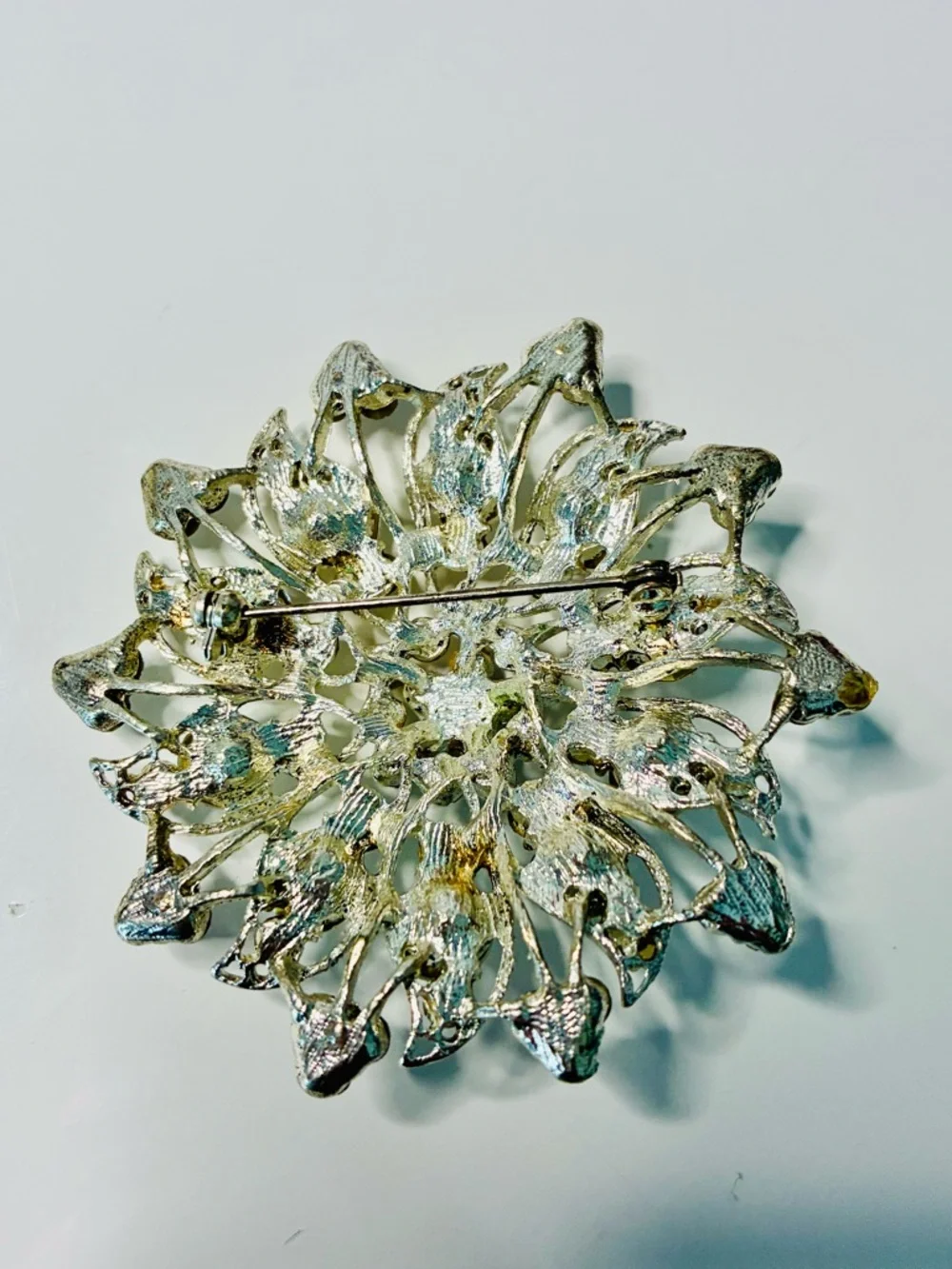Crystal Floral Burst Brooch - Light Blue Rhinestone Accent